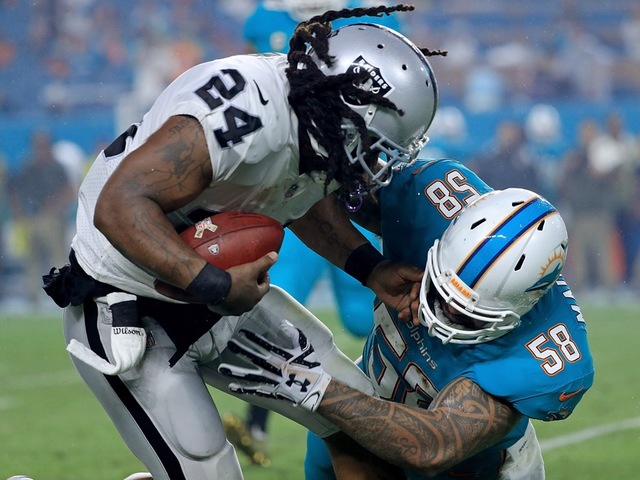 Dolphins linebacker Maualuga cut after overnight battery arrest