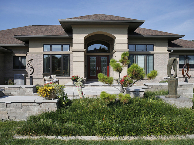 Home Tour: West Chester landscaping is architecture-inspired in the front, resort in the back